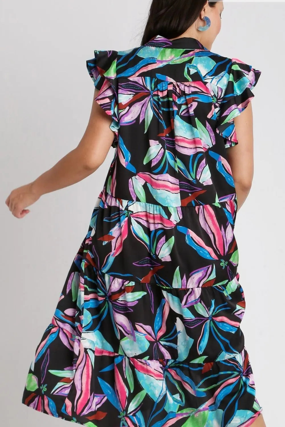 Plus size midi dress back detail with ruffled cap sleeves and tiered layers, leaf print.