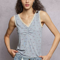 Powder blue ruched floral V-neck tank with scalloped lace trim at neckline