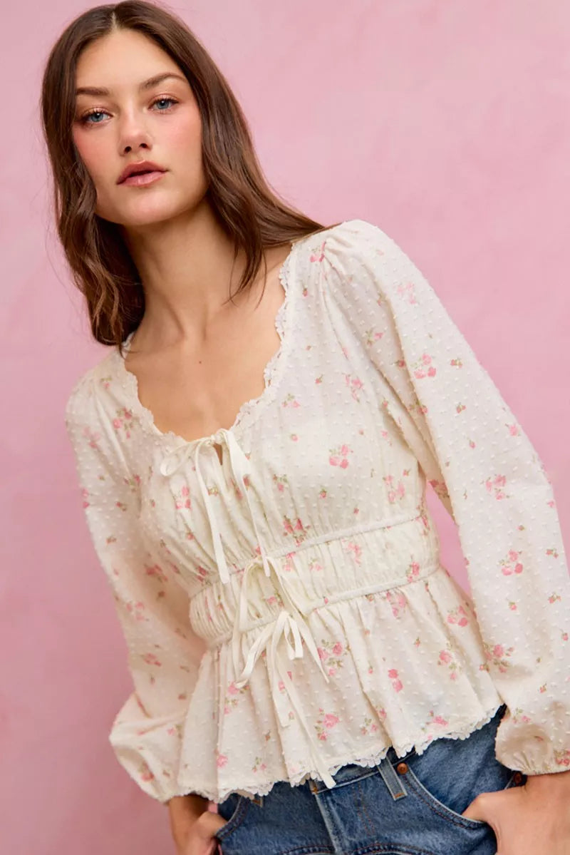 White floral clip-dot peplum blouse with lace-trim neckline and ruched drawstring bodice