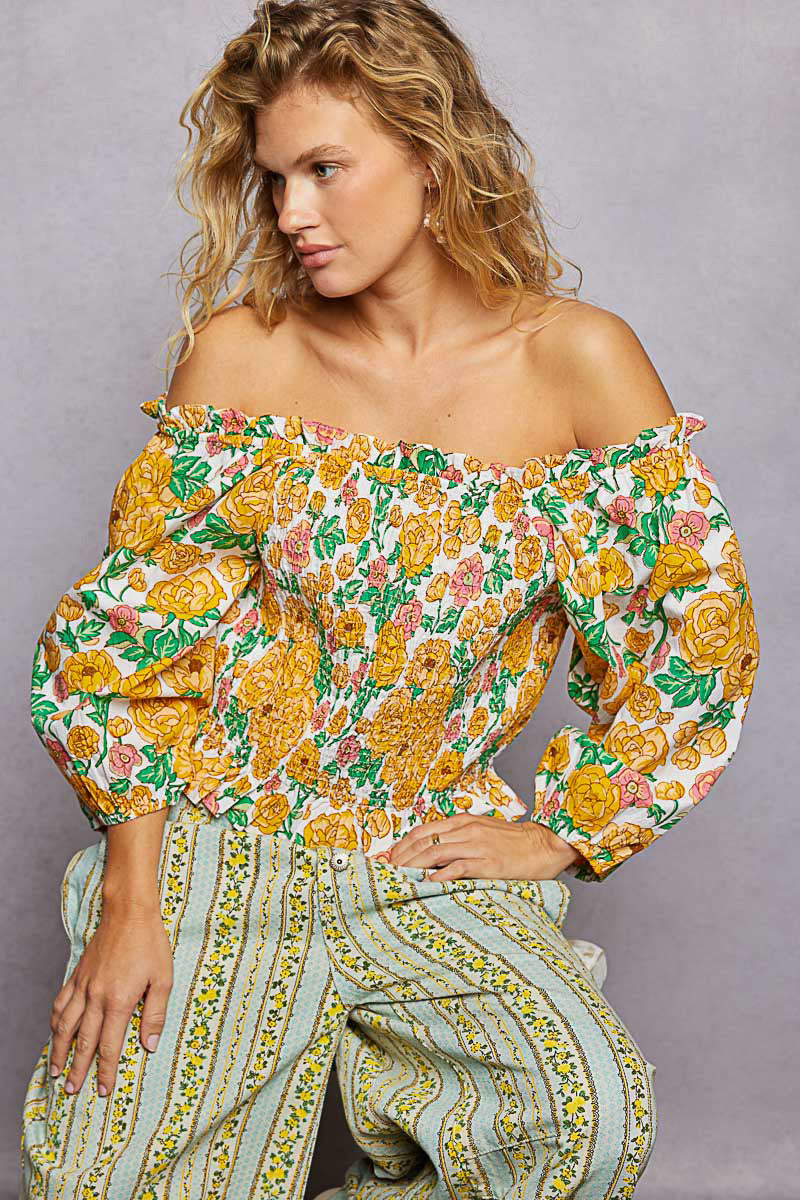 Floral off-shoulder smocked blouse with gathered neckline and long balloon sleeves