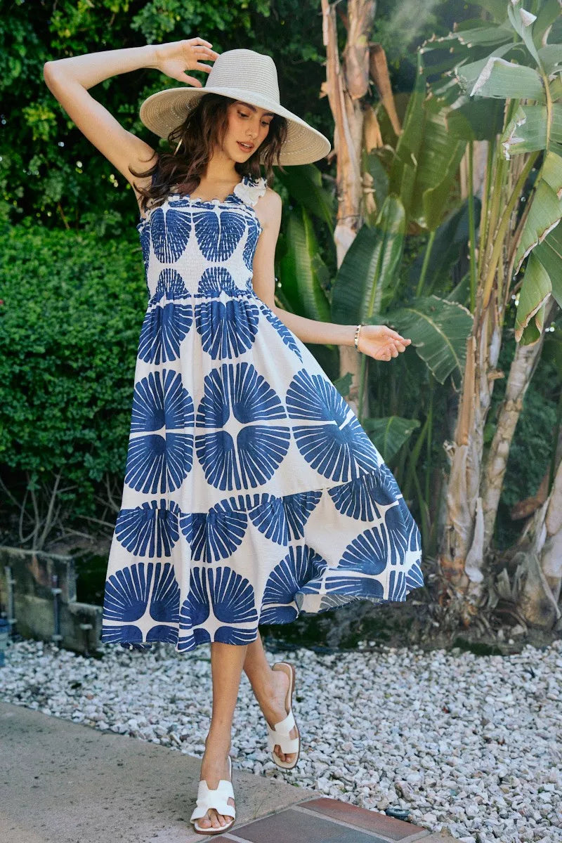 Smocked bodice tiered midi dress with navy abstract print, sleeveless, flared tiers