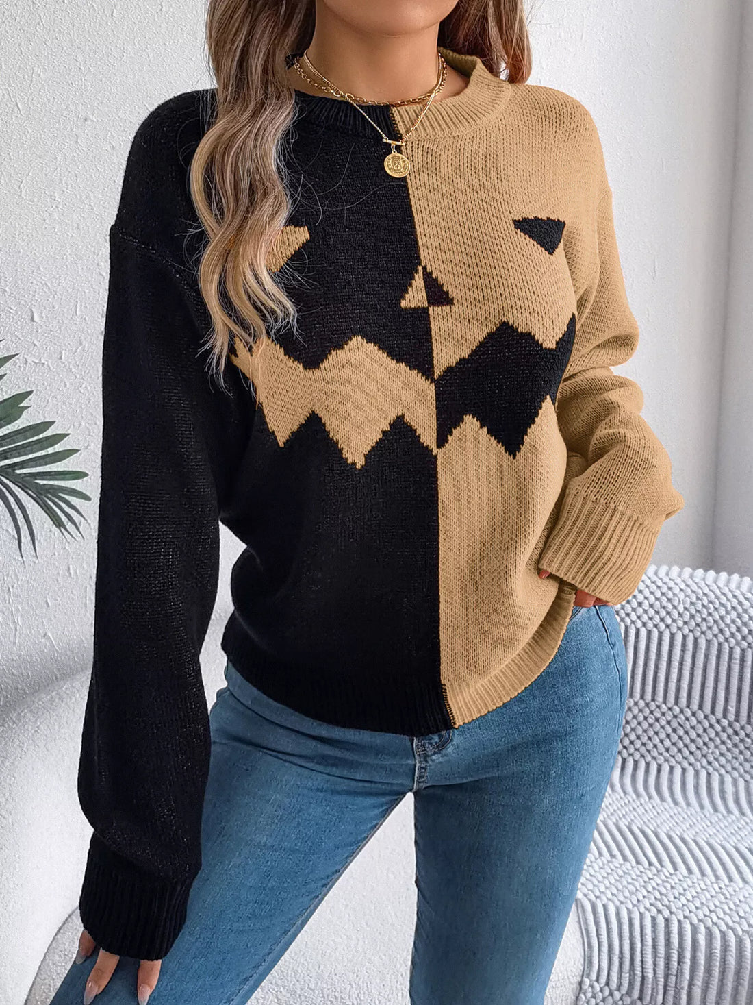 Two-tone pumpkin face graphic sweater, camel/black zip-front knit, long sleeves