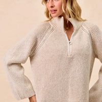 Two-tone rib knit half-zip top with raised collar, taupe and cream