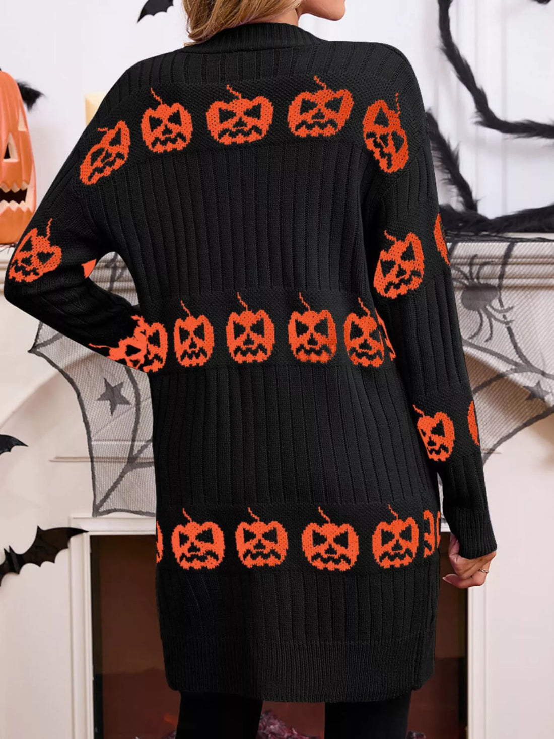 Black open-front knit cardigan with orange jack-o&