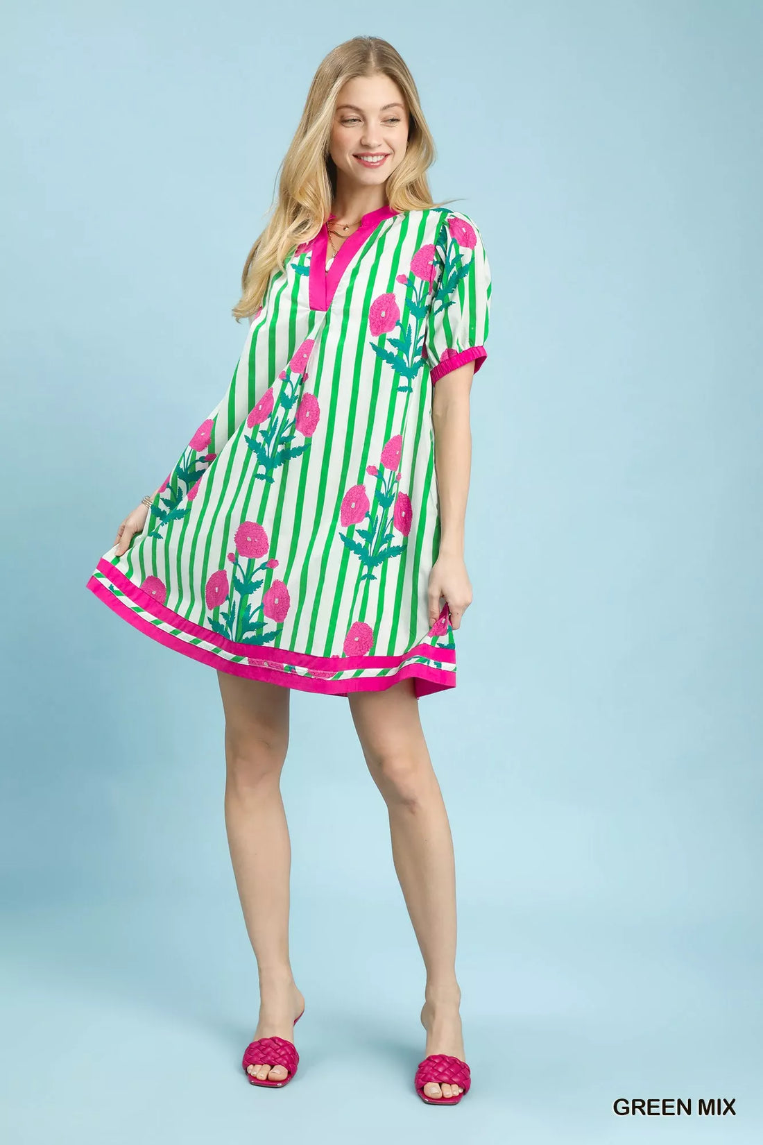 Green and pink striped floral contrast dress with pink trim, short sleeves