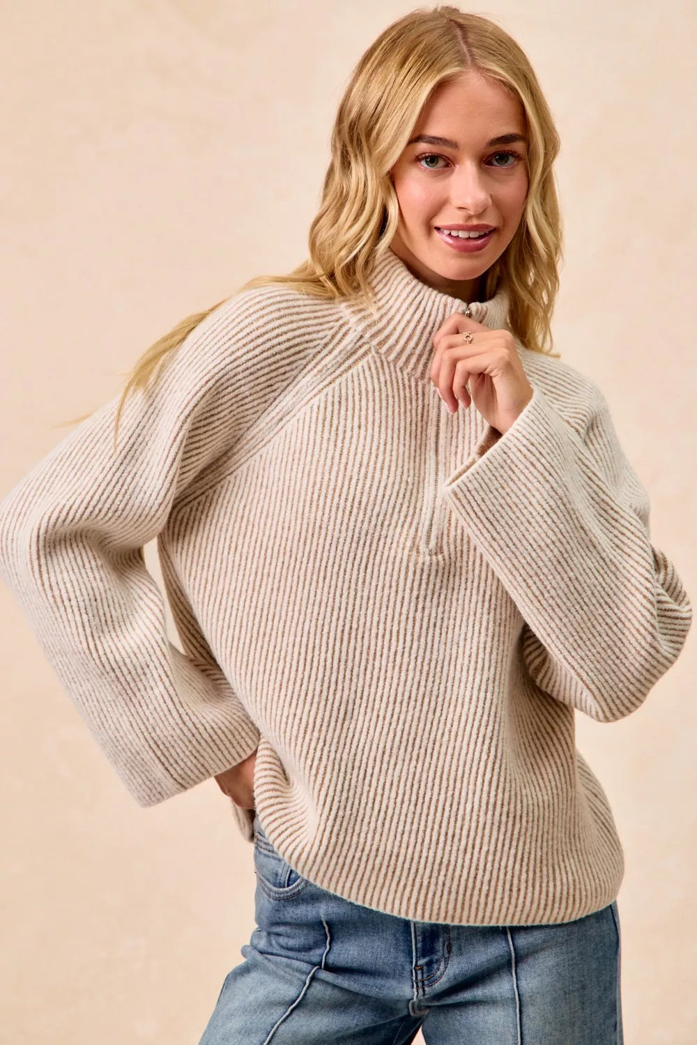 Two-tone rib knit half-zip sweater with raised collar, taupe and cream