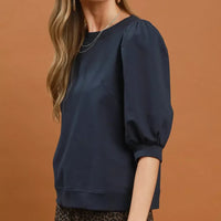 Navy crewneck sweatshirt with puff sleeves and relaxed hem