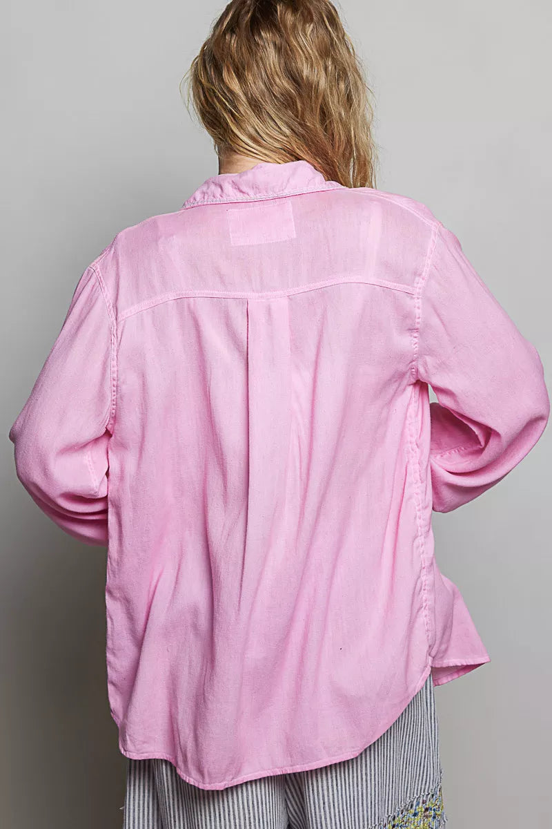 Candy pink western button-front shirt, back view with yoke and curved hem