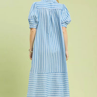 Blue-and-white striped midi dress, back view with gathered puff sleeves.