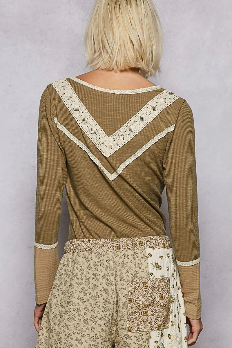 Olive ribbed knit top with white V-trim at back yoke and long sleeves