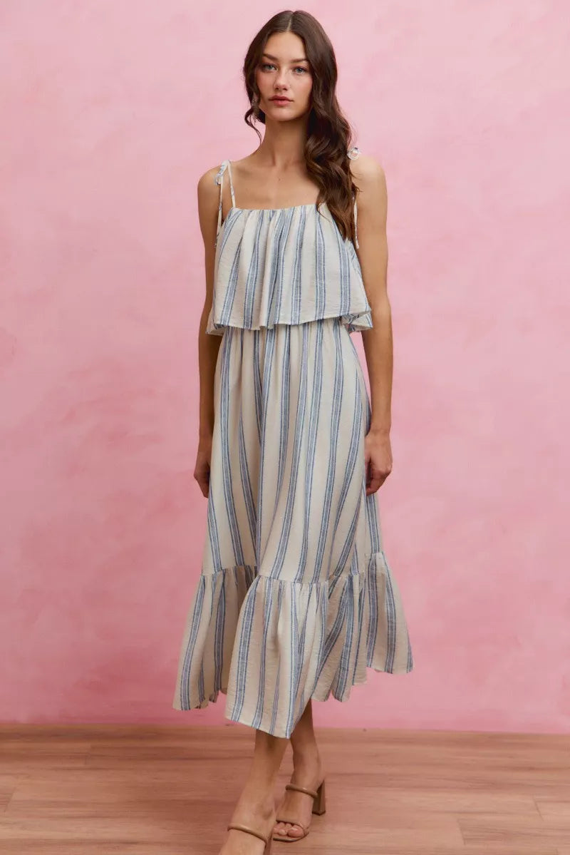 Blue and white striped midi dress with tiered skirt and tie shoulder straps