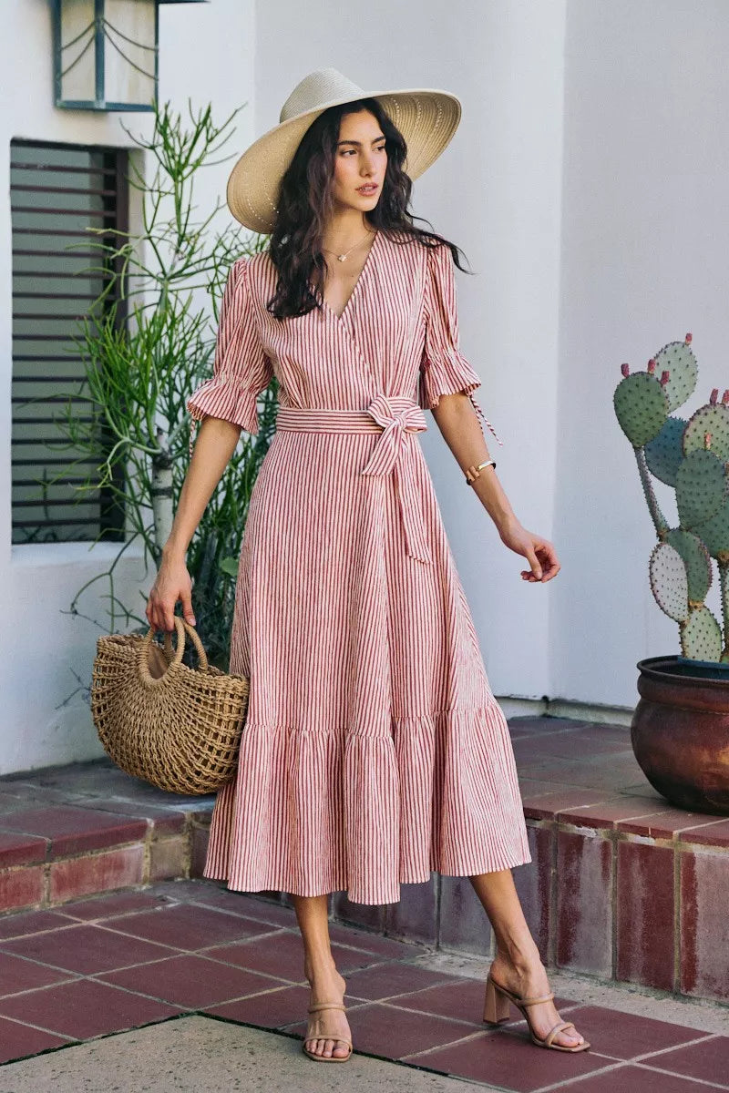 Red striped wrap midi dress with puff sleeves and waist tie; midi tiered hem