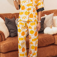 Pumpkin print lounge pajama set with short sleeves, button placket, polka-dot trim, pocket