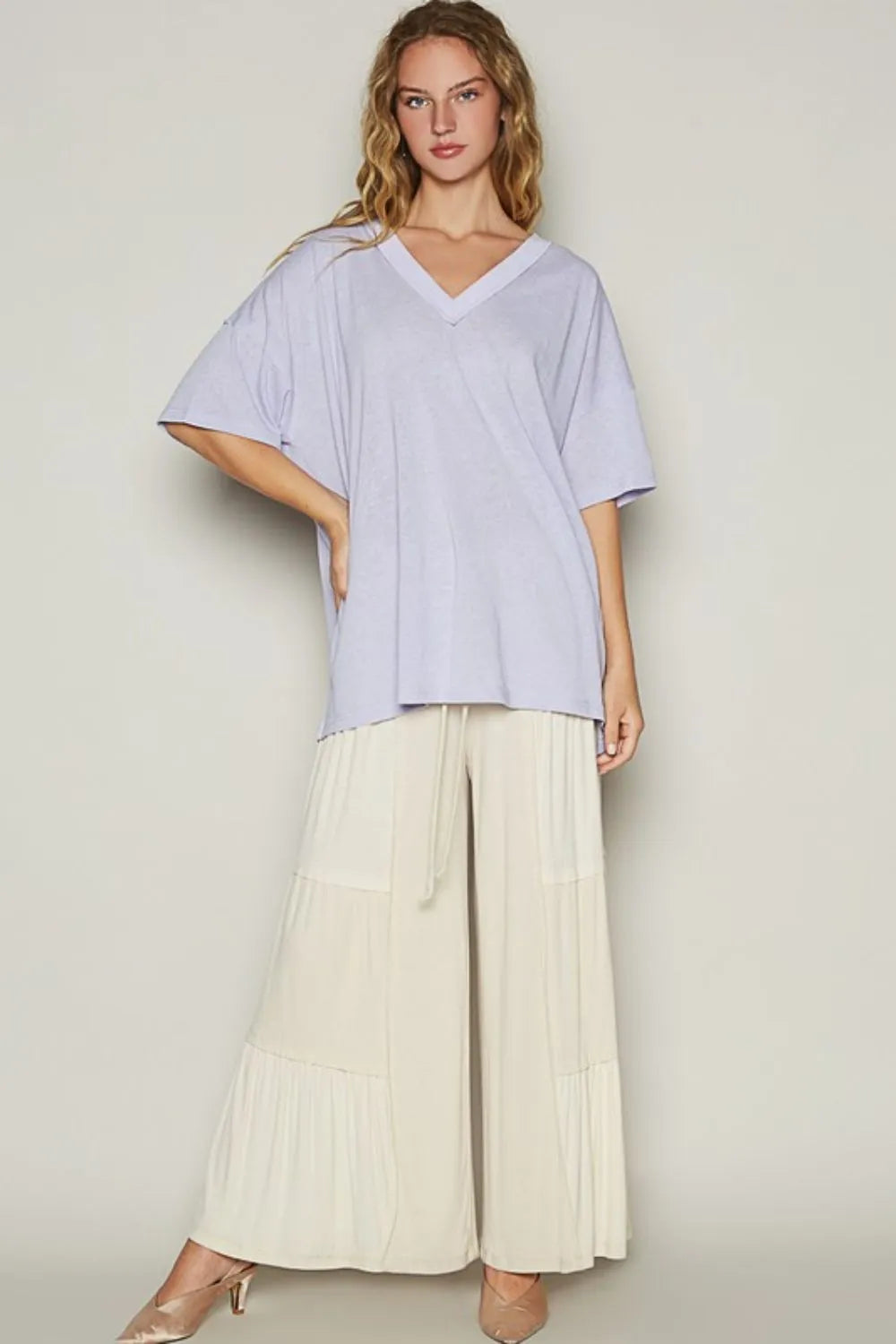 Lilac V-neck half-sleeve T-shirt with wide drape hem and relaxed silhouette