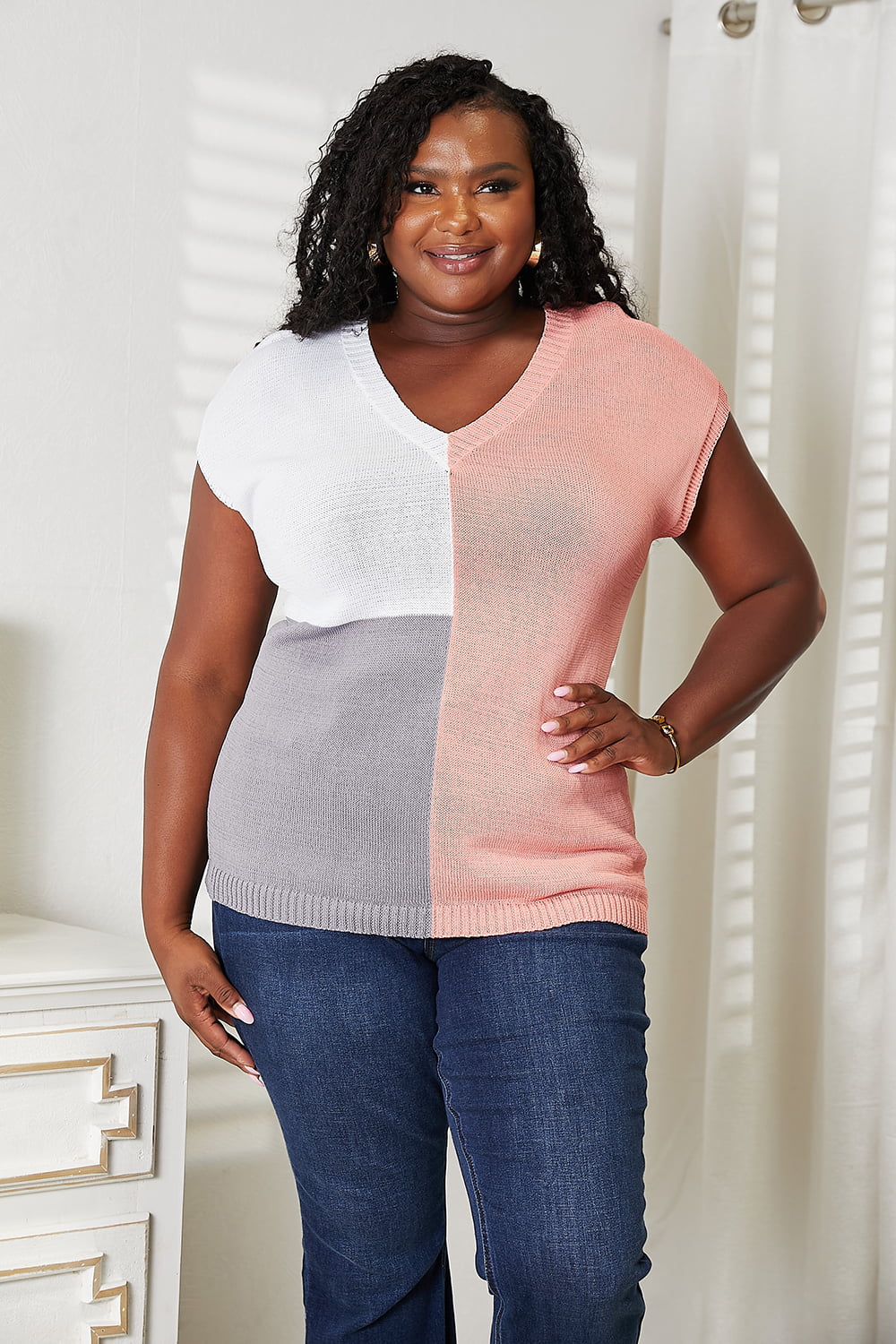 Color-block V-neck knit top in white, gray, and pink, short sleeves, full body view.