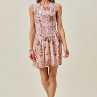 Taupe shell print smocked sleeveless mini dress with fit-and-flare skirt