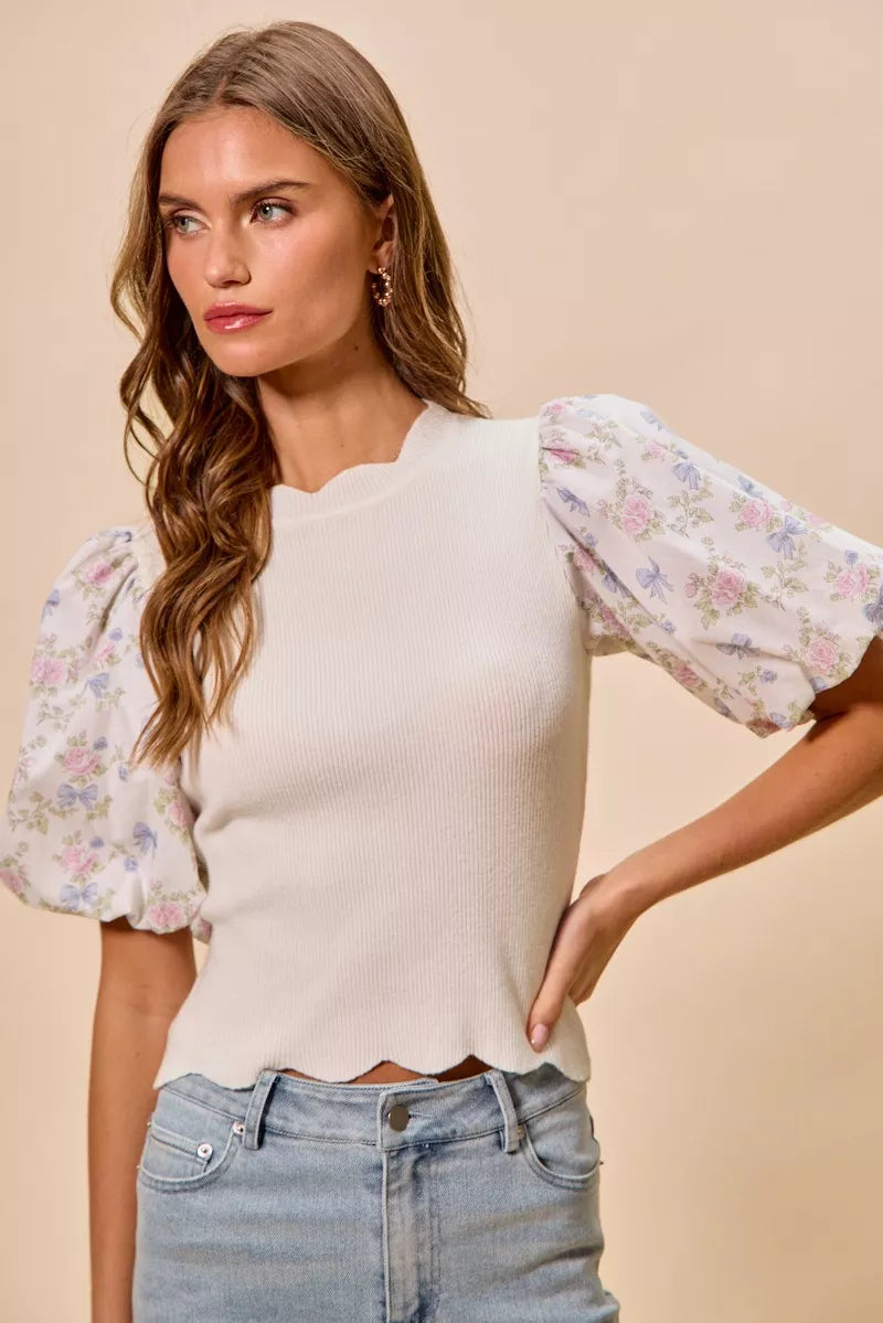 White knit sweater top with puff floral contrast sleeves and scalloped hem