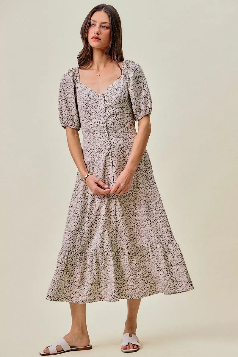 Ditsy floral midi dress front view, square neckline, puff sleeves, elastic waist belt