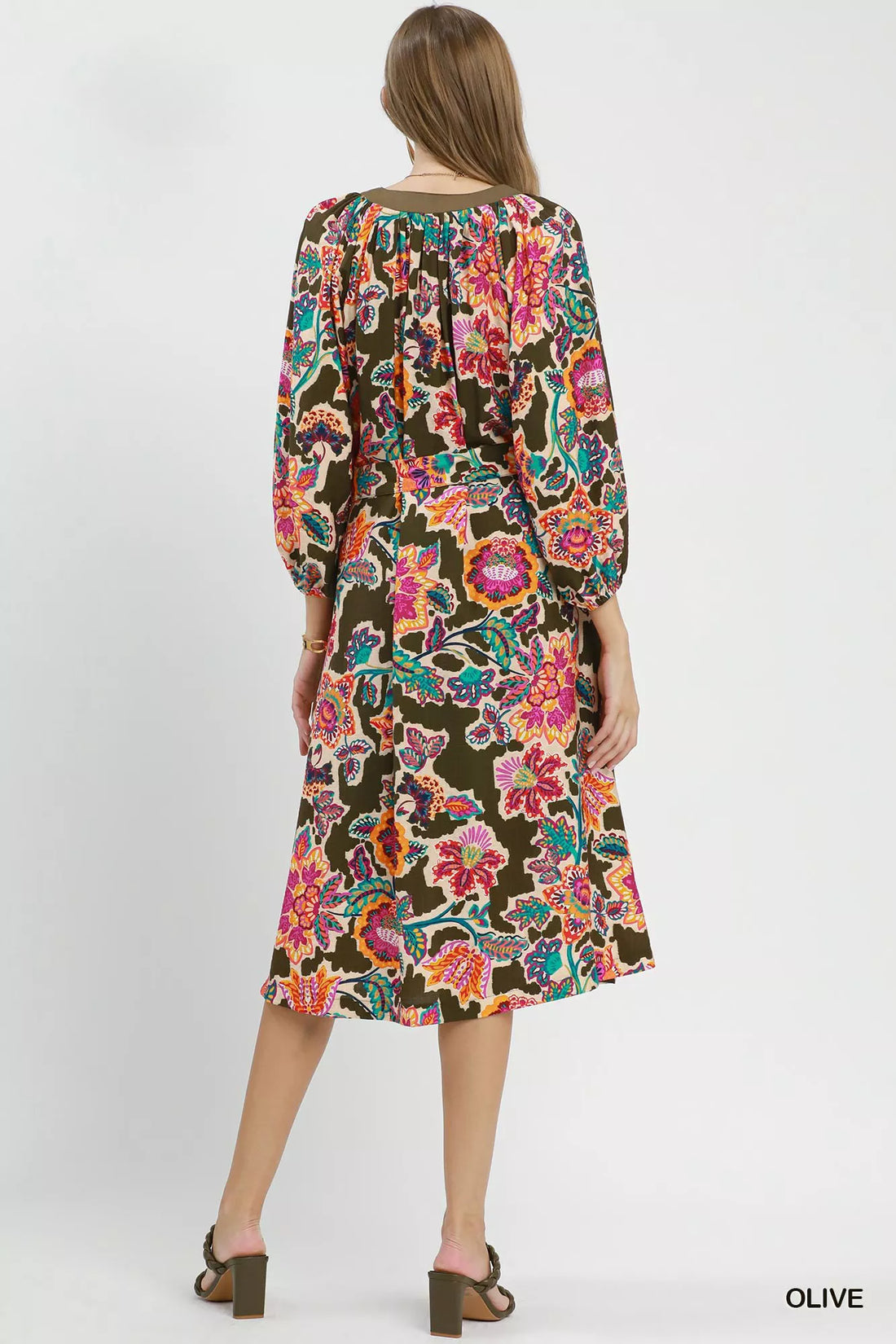 Belted midi dress back view, dark olive abstract floral print with long sleeves