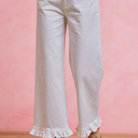 White mid-rise wide-leg jeans with ruffled hem detail