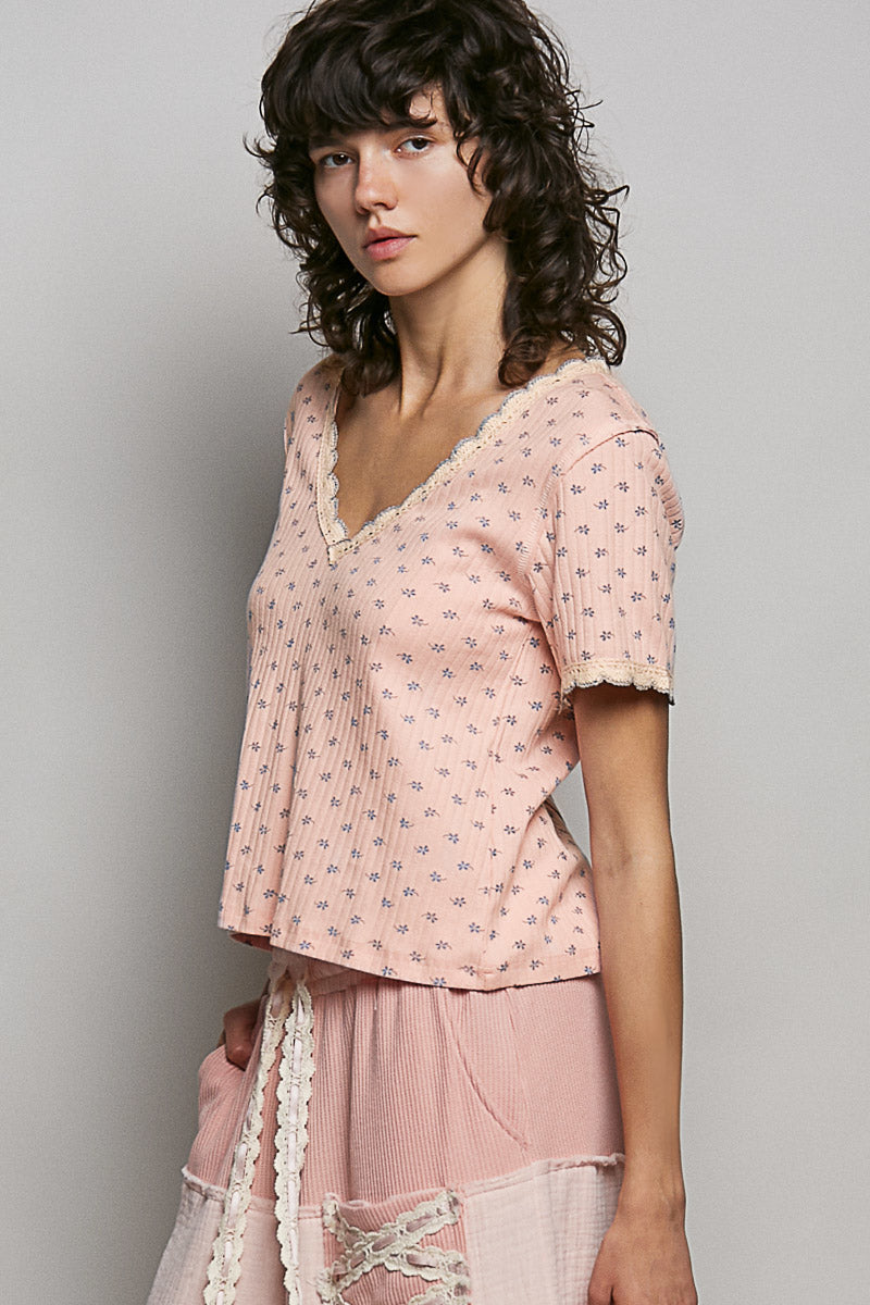 Soft pink floral V-neck T-shirt with scalloped lace neckline and short sleeves