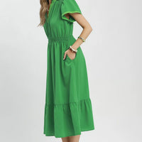 Kelly green midi dress with V-neck, flutter sleeves, smocked waist, tiered ruffle hem