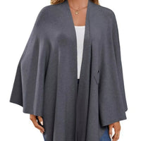 Dark gray cape shawl with open front, draped sleeves, and side pocket detail