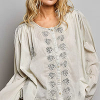 Embroidered pale grey button-front woven shirt with floral motifs, long puff sleeves