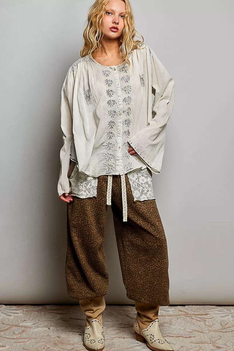 Pale grey embroidered button-front woven shirt with floral motifs, loose fit