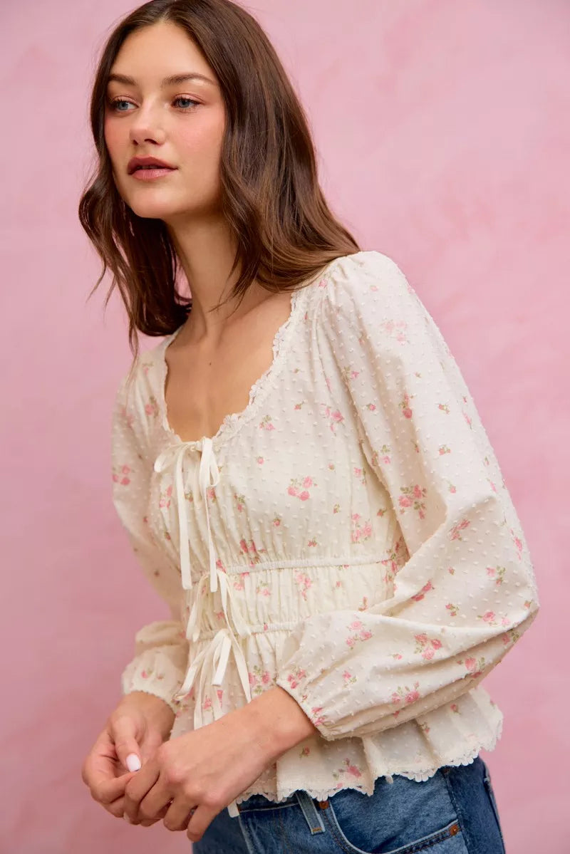 White floral clip-dot lace-trim blouse with ruched bodice, long balloon sleeves, and tie detail