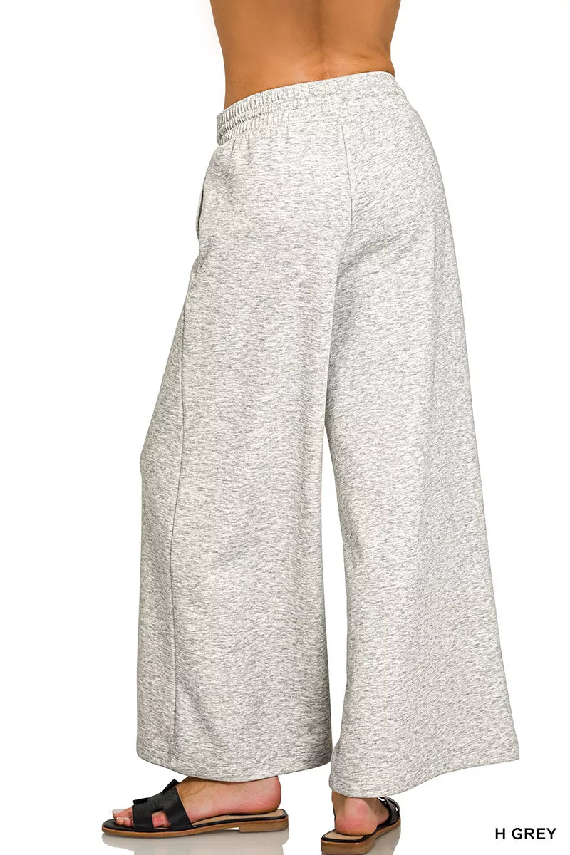 Heather grey wide-leg pants with drawstring waist and relaxed leg openings