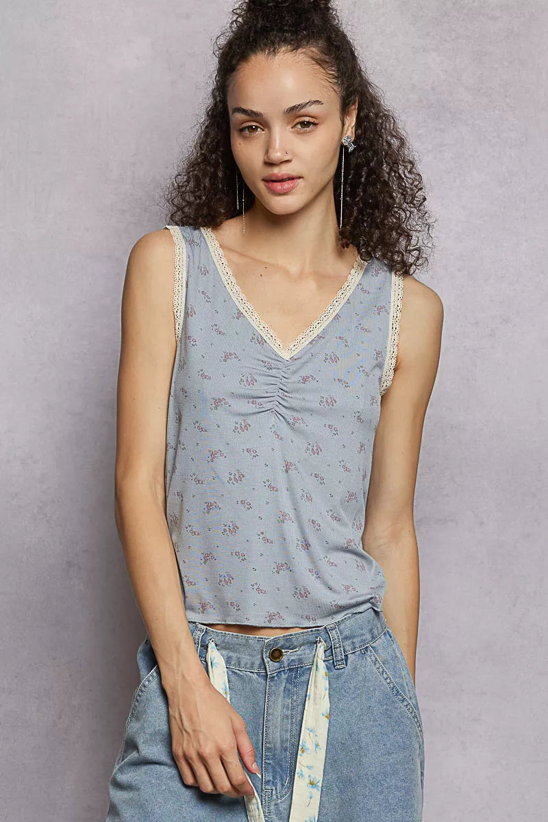Powder blue ruched floral V-neck tank with lace trim along neckline