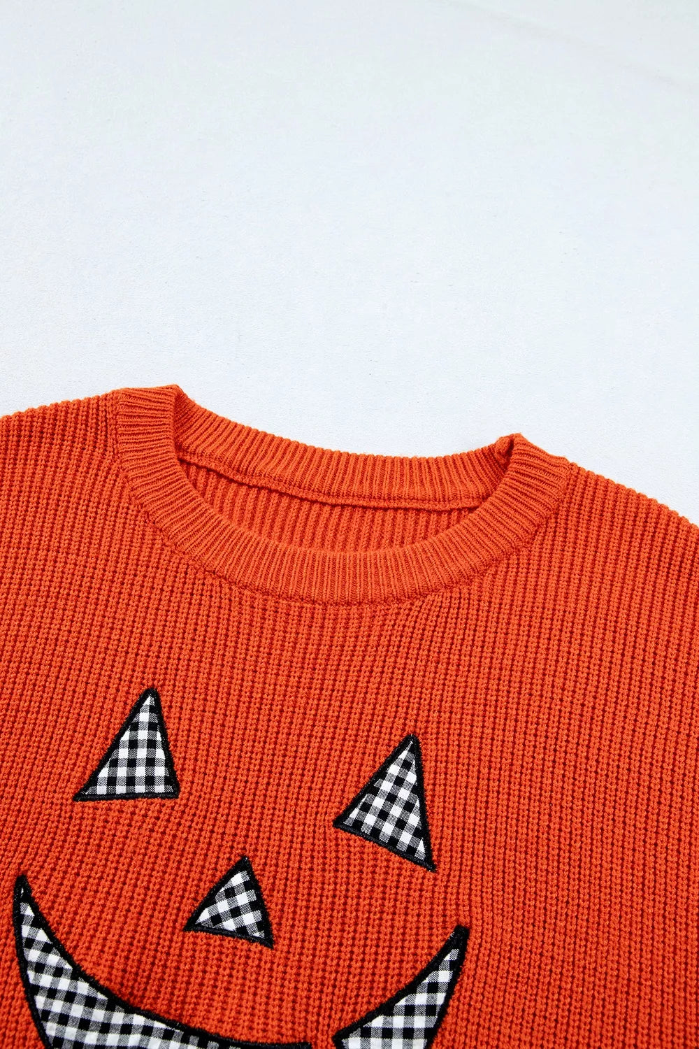 Orange sweater front with jack-o&