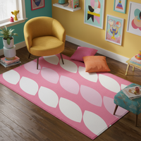 Pink and white abstract rug featuring large rounded geometric motifs