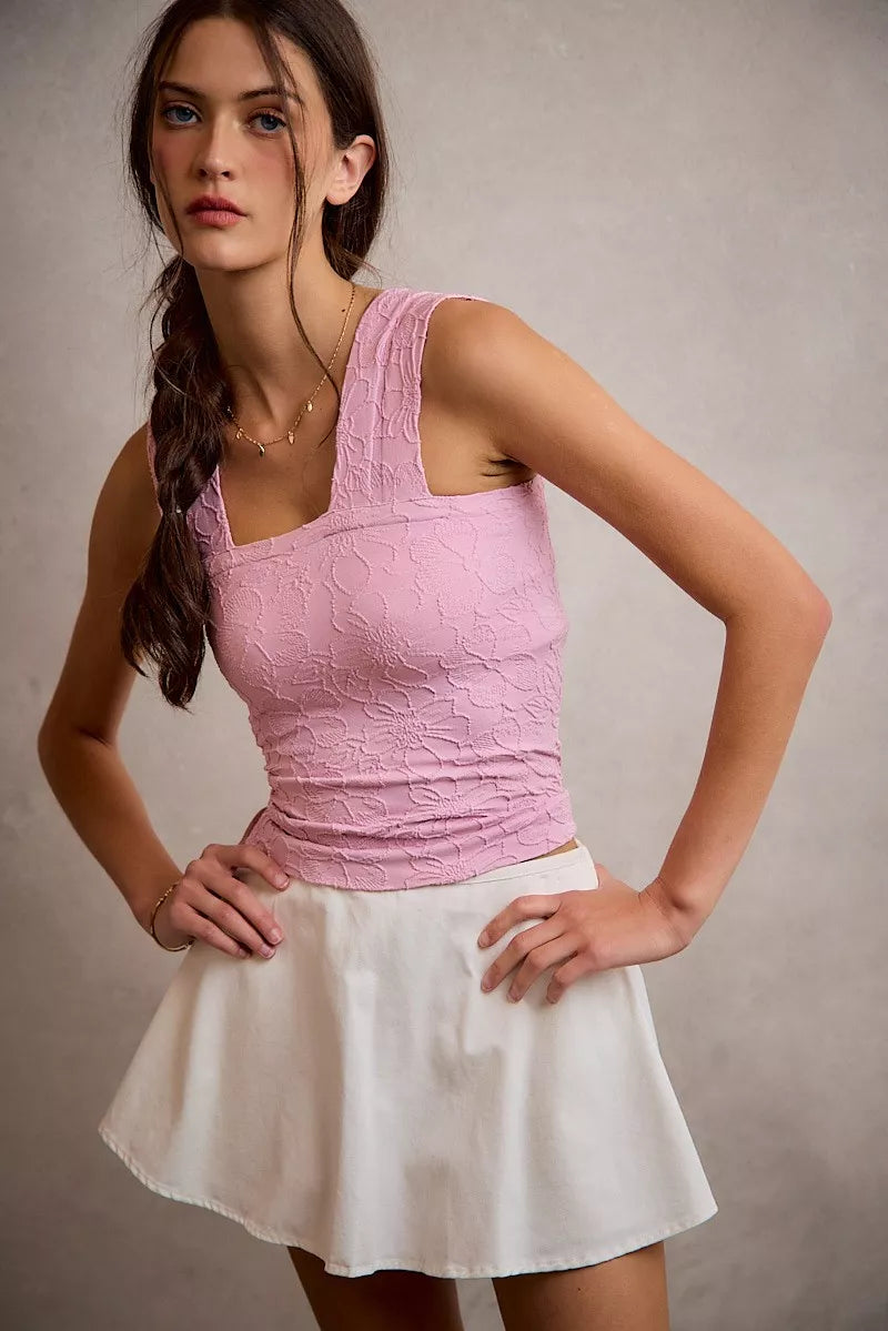 White flared mini skort with smocked back waistband and bubble skirt hem