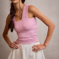White flared mini skort with smocked back waistband and bubble skirt hem