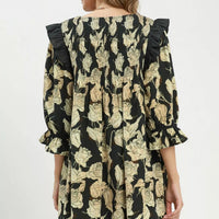 Black-and-cream floral ruffle-sleeve dress with smocked back yoke