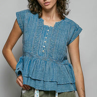 Denim blue sleeveless eyelet-embroidered pintuck blouse with front buttons