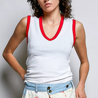 Off-white ribbed V-neck sleeveless tank with red contrast neckline and armholes