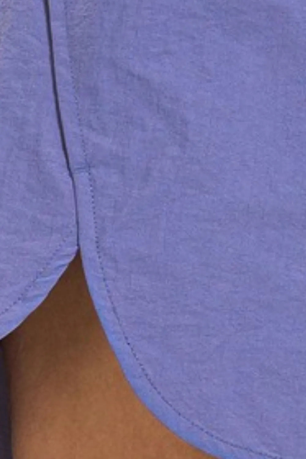 Light blue windbreaker running shorts with elastic smocked waistband