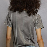Grey pinstripe V-neck short sleeve top with visible stitch seam detail, back view