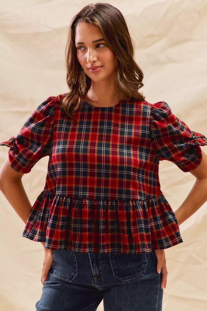 Red plaid peplum top with ribbon bow sleeve ties and short puff sleeves