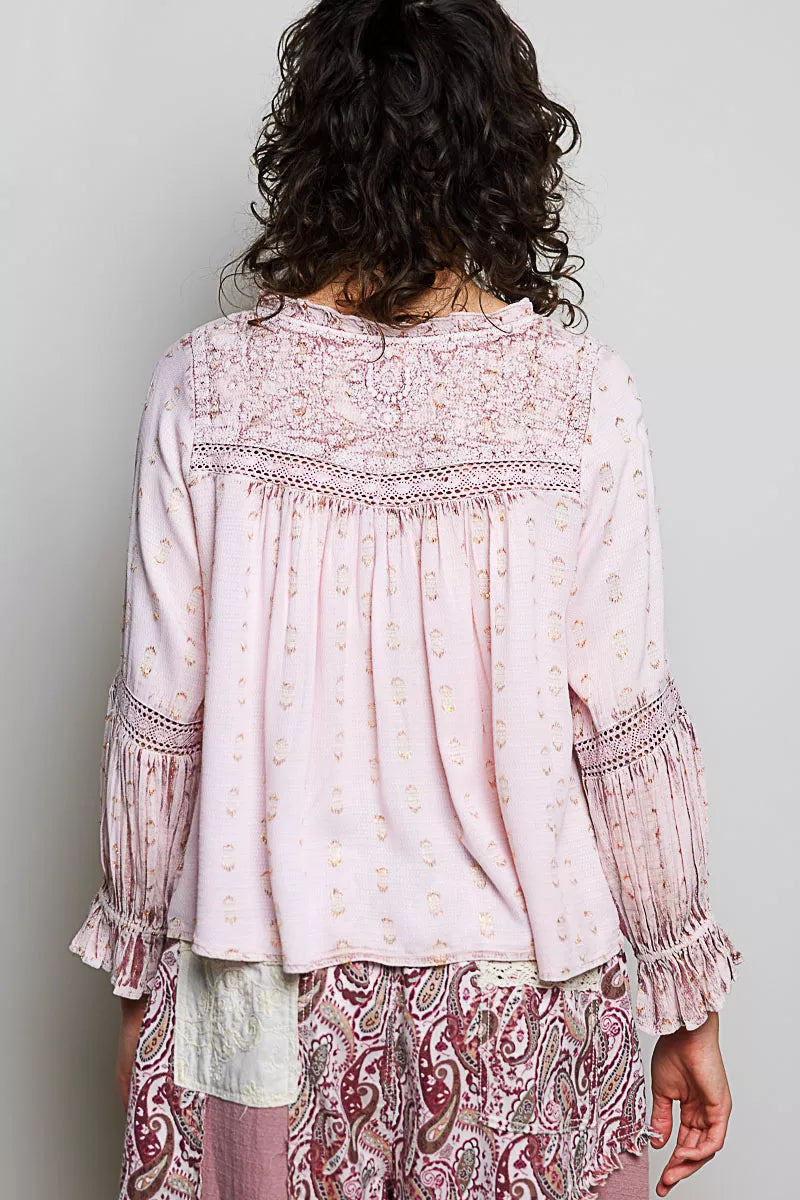 Rose pink lace-trim blouse with embroidered yoke and ruffled cuffs, back view