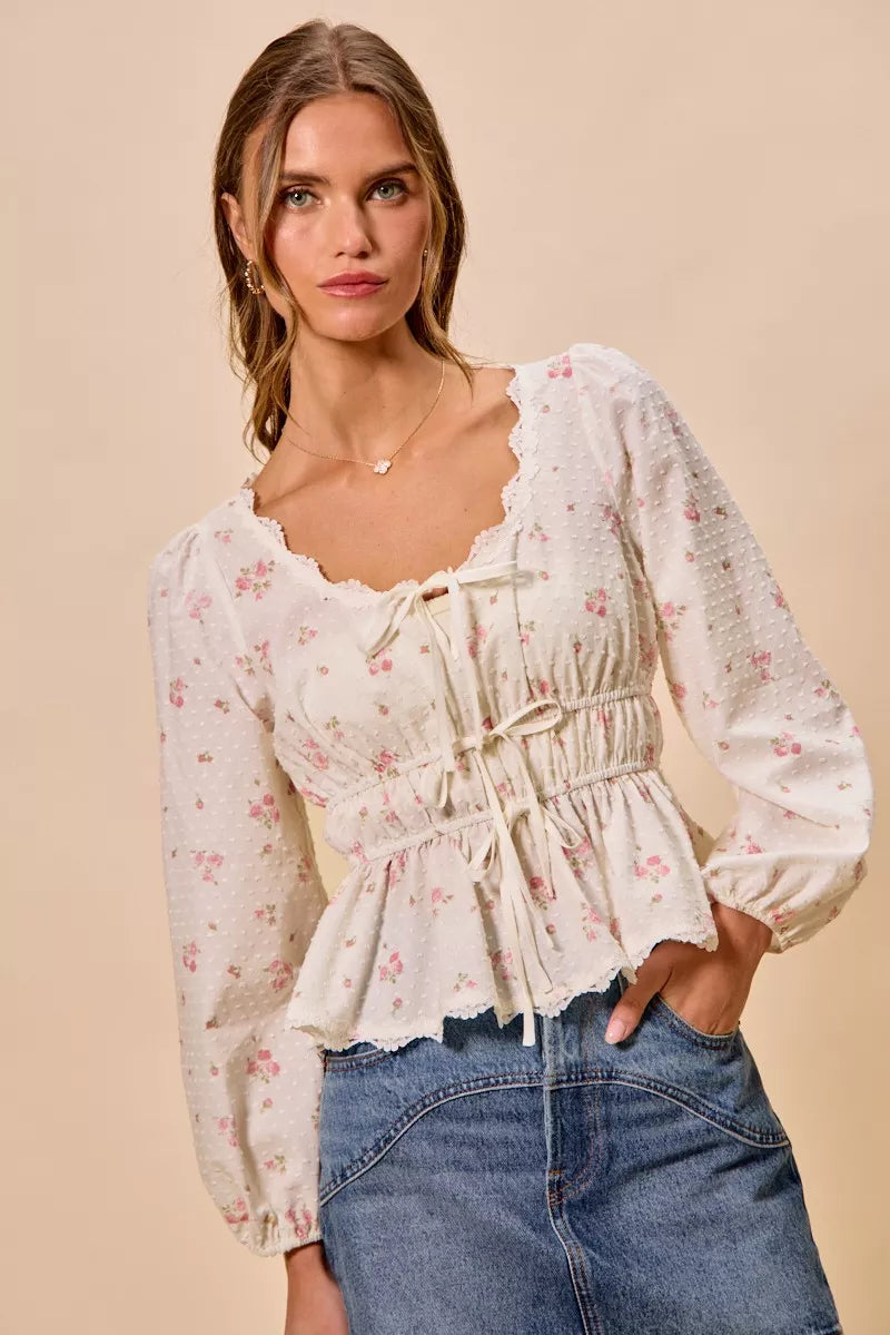 White floral clip-dot peplum blouse with scalloped lace neckline and gathered ruched center