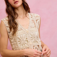 Natural crochet sleeveless vest top with V-neck and textured floral square design