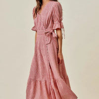 Red striped wrap midi dress with short puff sleeves and knotted belt; ruffled tiered skirt