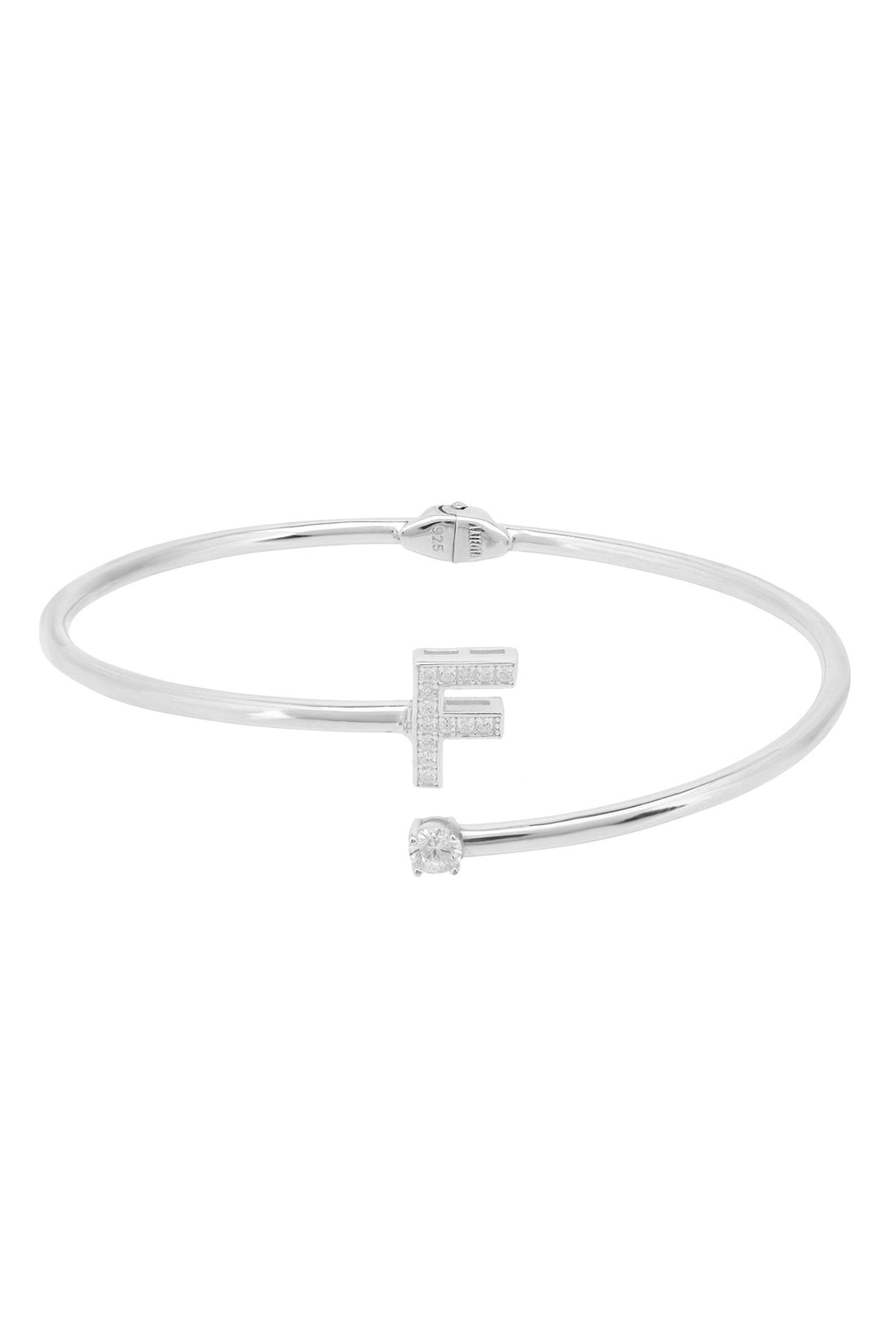 Silver slim bangle with crystal initial F centerpiece, top view