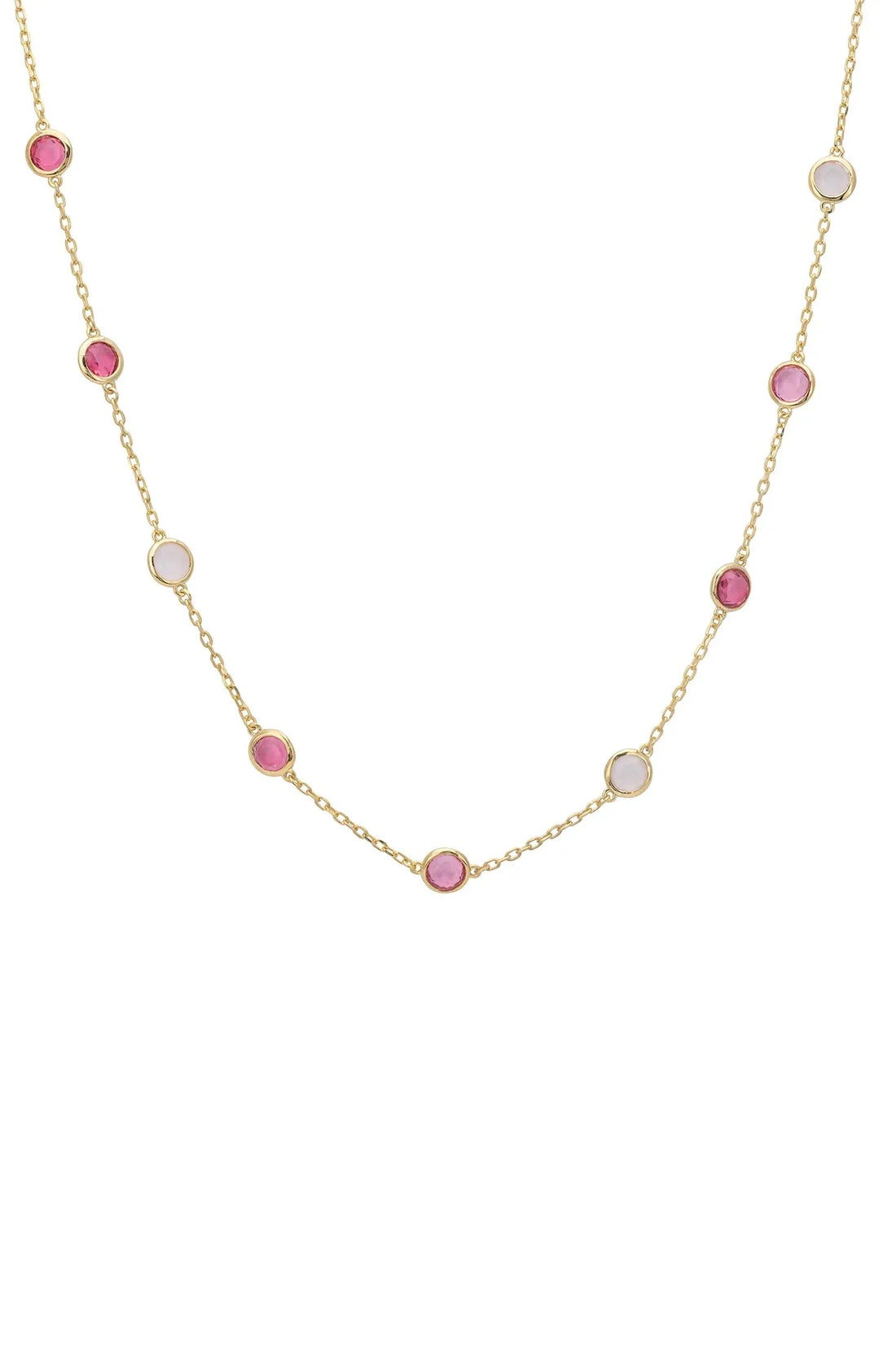 Gold necklace with pink and light blue bead charms on a fine chain