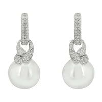Silver-tone drop pearl earrings with sparkling dangle accents