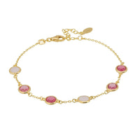 Gold charm bracelet with alternating oval pink and pale gray stones